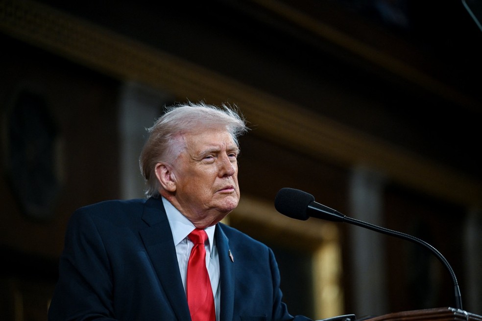 Presidente Donald Trump em discurso no Congresso dos EUA. — Foto: Kenny HOLSTON / POOL / AFP