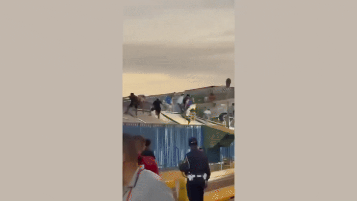 Vídeo mostra imigrantes subindo em telhas e pulando muros para entrar na Espanha - QTU Questões do Universo